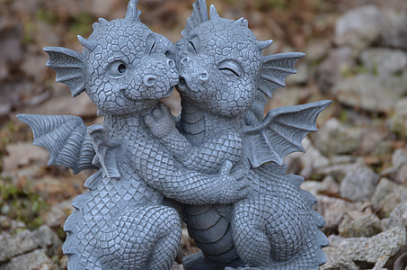 two gray Dragon ceramic figurines thumbnail