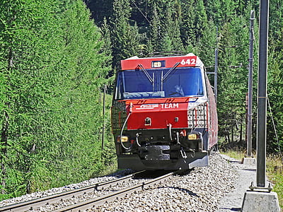time lapse photography of red train thumbnail