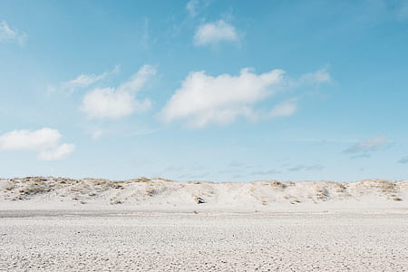 white sand under cloud thumbnail