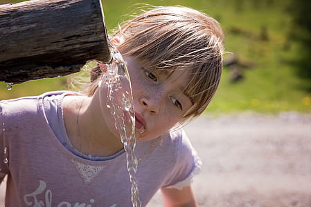 child drinking flowing water thumbnail