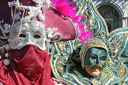 two person wearing green and silver masks thumbnail