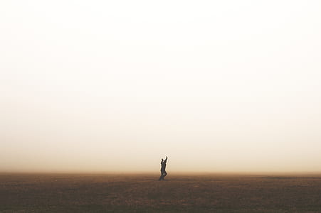 silhouette of person in the middle of desert thumbnail