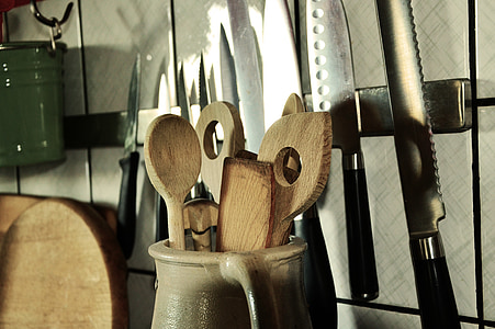 ladle in pitcher near kitchen knife thumbnail