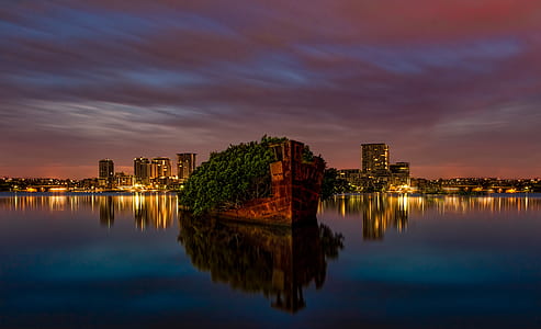 far view of city buildings during nighttime thumbnail