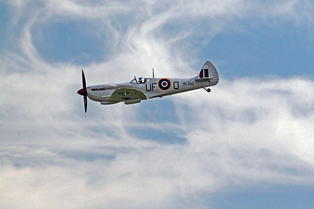 gray stunt plane on sky thumbnail