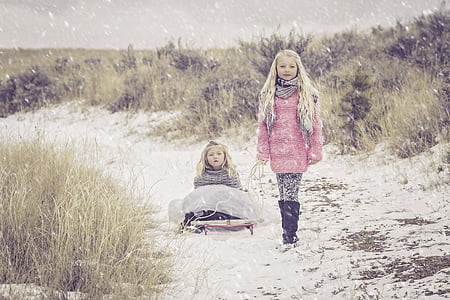 two girls wearing pink and gray sweats during winter thumbnail
