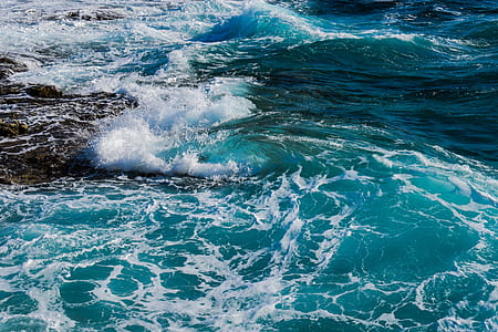 sea wave during daytime thumbnail