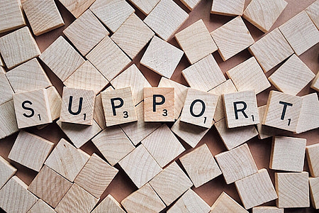 brown and black support scrabble tiles thumbnail