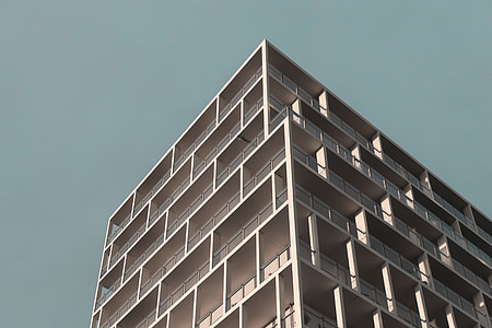 low-angle photo of gray concrete building thumbnail