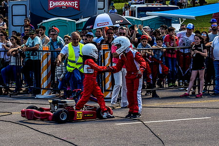 Two Boy in Red and White Racing Costume thumbnail