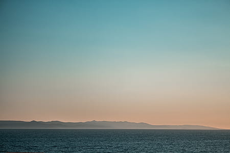 body of water during dawn thumbnail