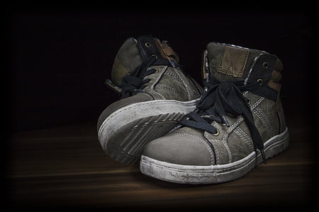 pair of gray high-top shoes thumbnail