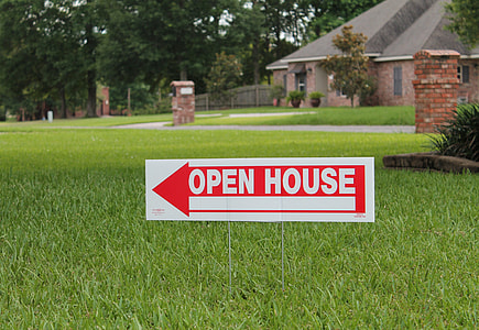 open house signage near house thumbnail