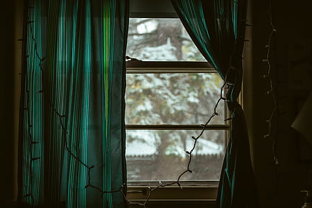 string light hanging on window thumbnail
