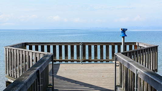 brown dock overseeing sea water thumbnail