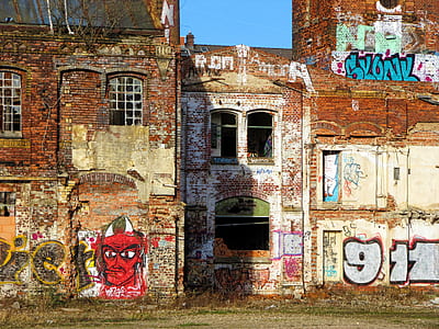 concrete building with graffiti thumbnail