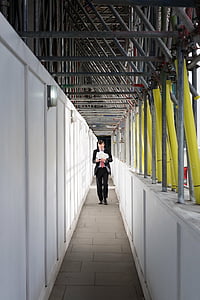 man walking on gray concrete pavement thumbnail
