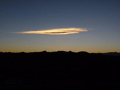 silhouette of mountain under white cloud thumbnail