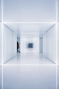woman crossing hall thumbnail