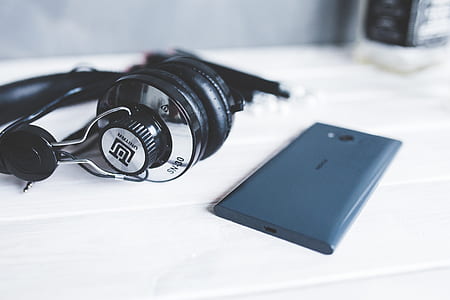 Closeup of headphones with smart phone II thumbnail