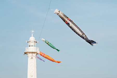 five inflatable fish hang on lighthouse thumbnail