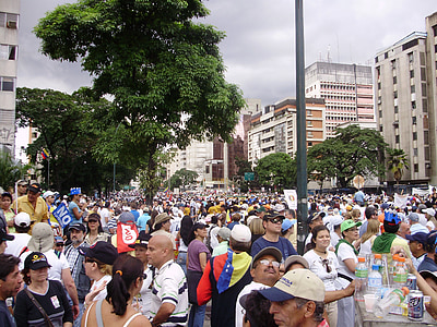 people gathering at road thumbnail