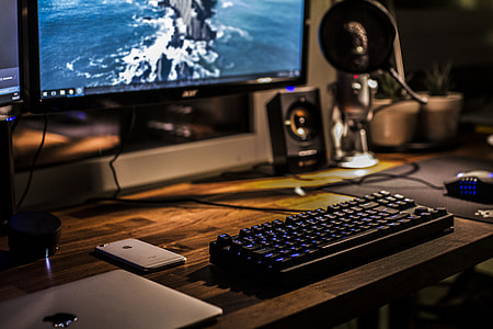 turned on Acer flat screen monitor with mechanical keyboard and mouse thumbnail