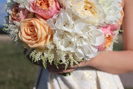 woman holding flower bouquet thumbnail