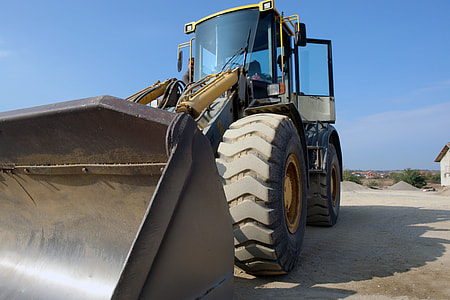 yellow and black front loader thumbnail
