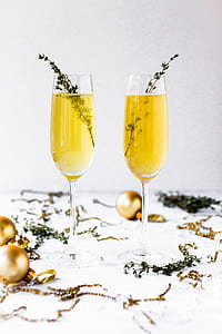 two clear long stem wine glasses thumbnail