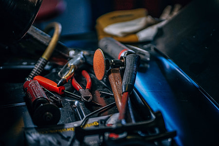 shallow focus photography of brown and black hand tools thumbnail