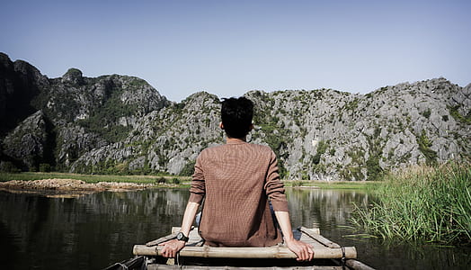 person sitting on wooden board thumbnail