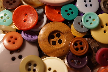pile of assorted-color buttons thumbnail
