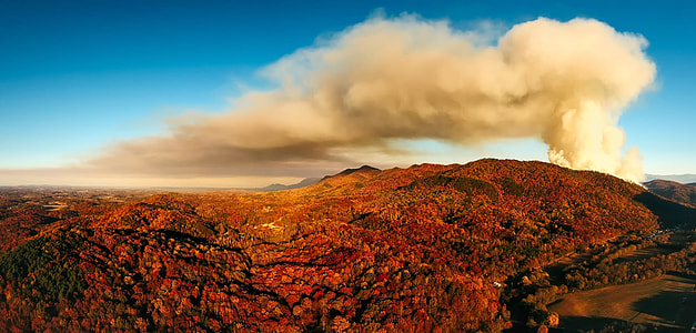 brown volcano at day time thumbnail