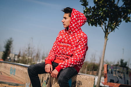 man sitting on concrete platfrom thumbnail
