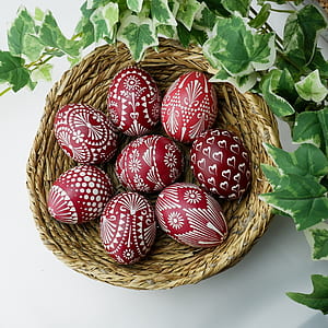 red-and-white painted eggs on basket thumbnail
