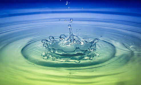 water droplet in water forming ripples thumbnail