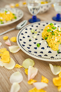 Risotto with broad bean on a cute plate with blue hearts thumbnail