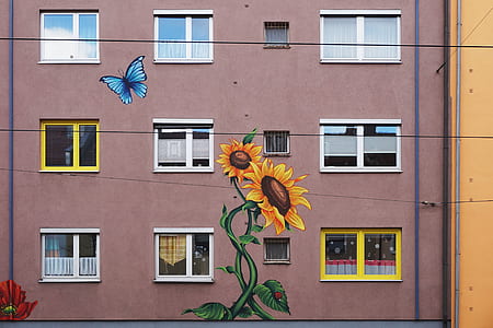 blue butterfly flying near sunflower painting thumbnail