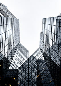 low-angle photography of skyscraper buildings thumbnail