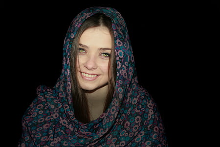 woman wearing blue and teal floral hijab headdress thumbnail