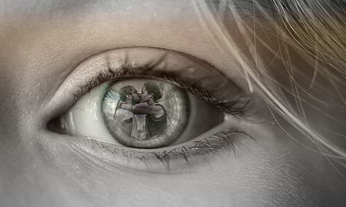 grayscale photography of woman watching couple kiss thumbnail