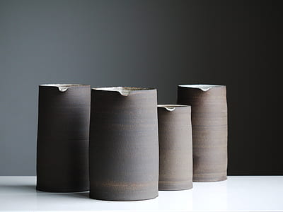 four brown vases thumbnail