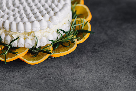 Meringue Cake with whipped cream and oranges thumbnail