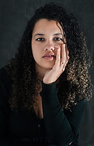 Woman Wearing Black Long-sleeved Top thumbnail