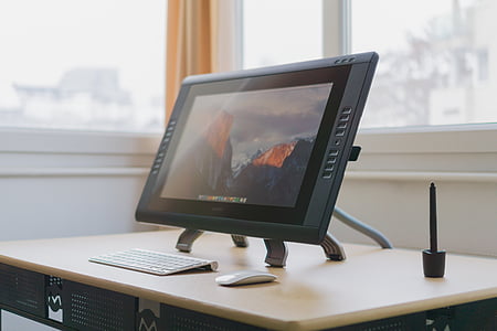 turned-on Apple monitor thumbnail