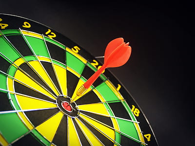 dart on red dartboard thumbnail