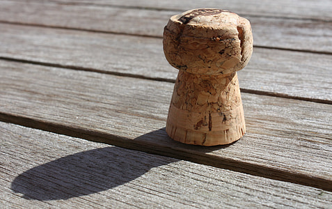 brown cork place on wooden surface thumbnail