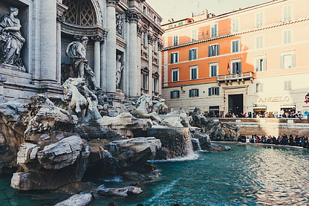 people standing near fountain thumbnail