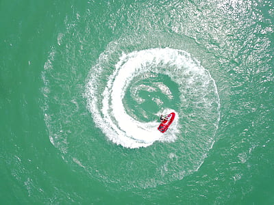 aerial photography of person on boat thumbnail